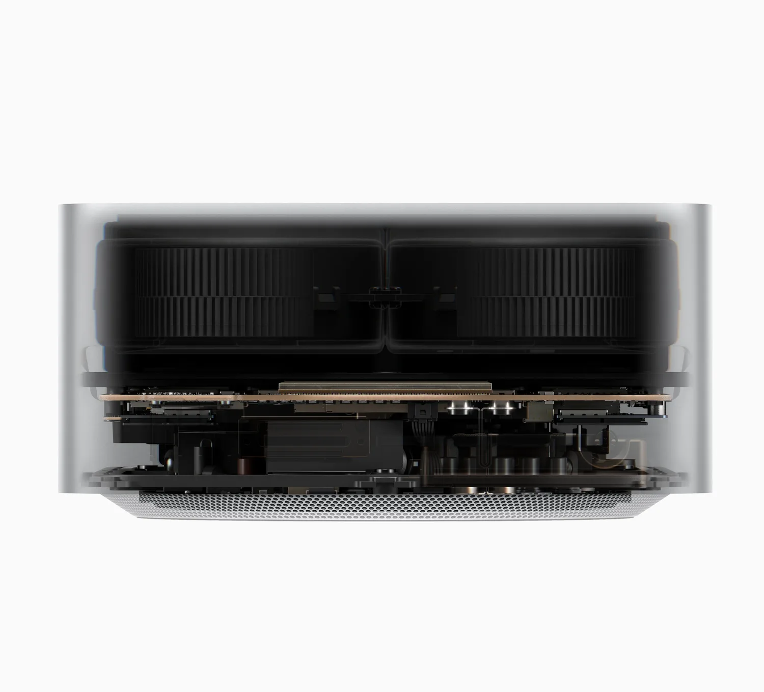 A cutaway inside the Mac Studio showing dual blower fans and the logic board